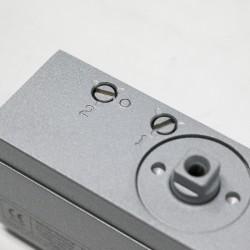 Boss TS6.224 Door Closer Cover Adjustment Valve Close Up Boss TS6.224 Door Closer Cover Adjustment Valve Close Up