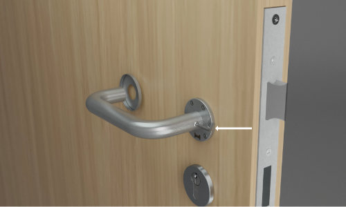 Allen key screwing in bolt on door handle