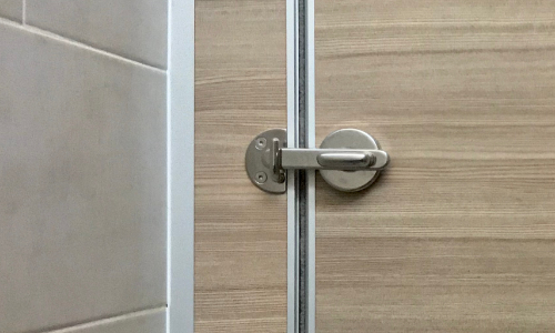 Bolt on toilet door