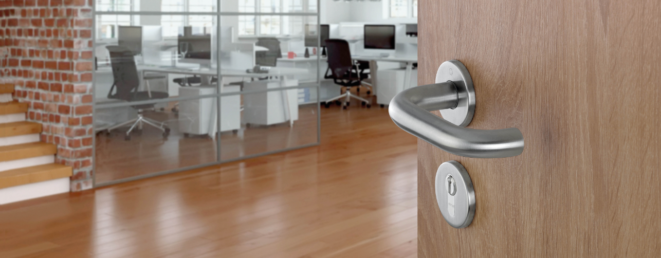 Hoppe door handle on a door for an office